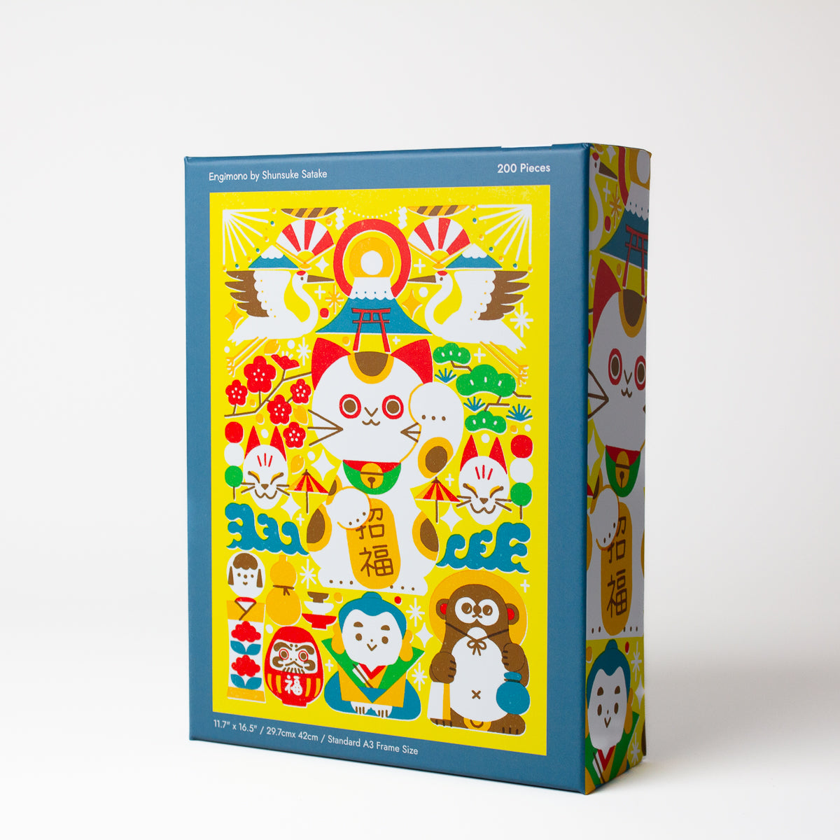 Colorful puzzle box with Japanese lucky characters on a yellow background