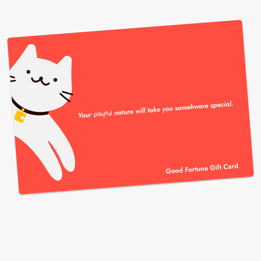 A digital gift card with a red background featuring an illustration of a white cat with a red collar. The text on the card reads 'Your world, somewhere special' and 'Good Fortune Gift Card'.